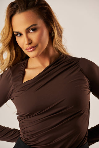 BLUSA DECOTE ASSIMÉTRICO MANGA LONGA