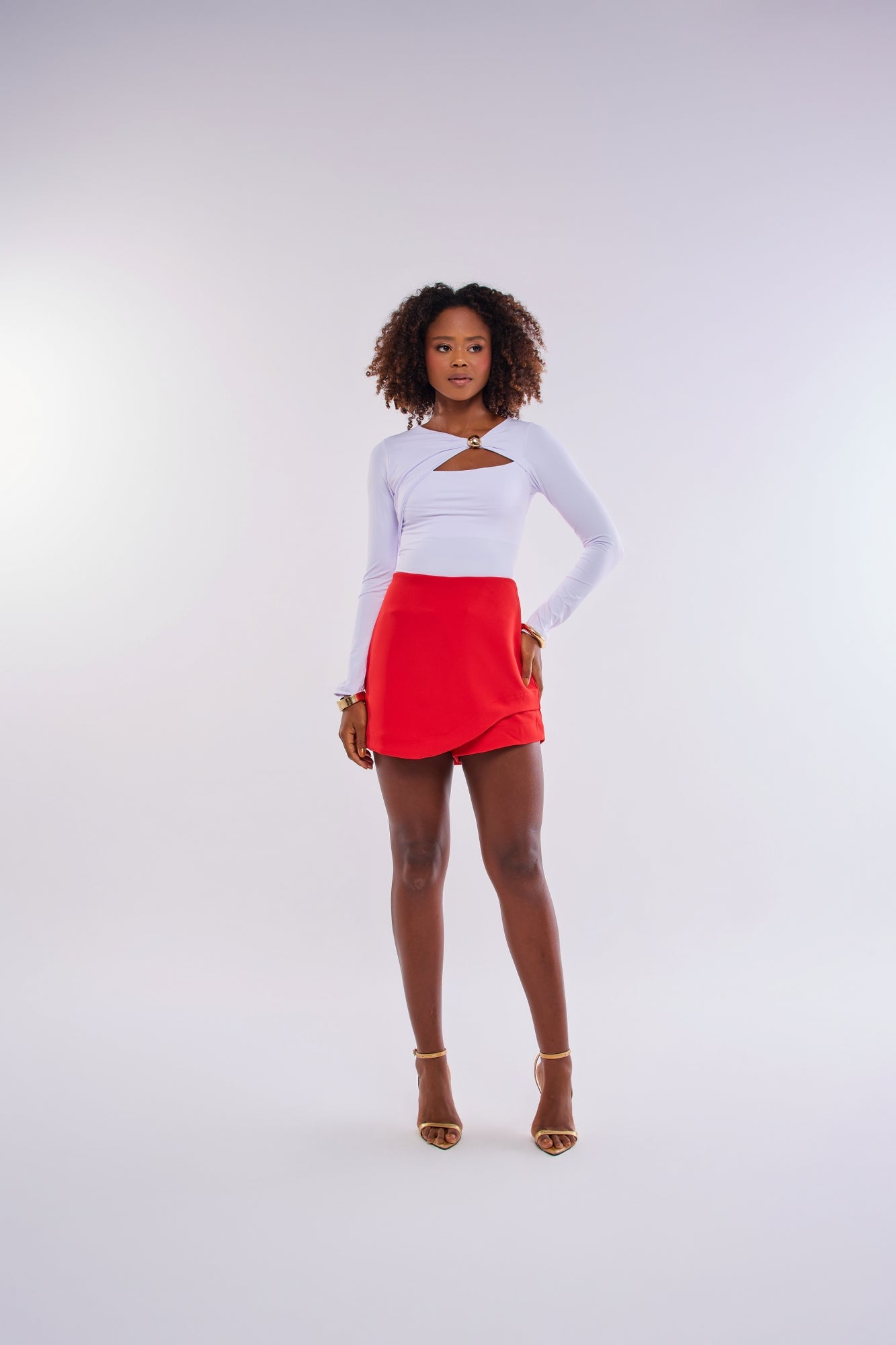 BODY MANGA LONGA COM AJUSTE METÁLICO