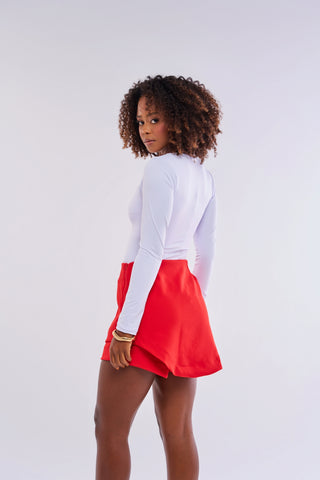 BODY MANGA LONGA COM AJUSTE METÁLICO